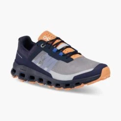 On Running Women's Cloudvista Trail Shoe - Midnight/Copper- Regular (B) -Gazelle Sports Shop 64.98592 cloudvista fw22 midnight copper w g6