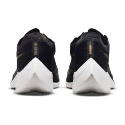 Nike Men's ZoomX Vaporfly Next % 2 Racing Shoe - Black/White/Metallic Gold Coin - Regular (D) 15 Nike Men's ZoomX Vaporfly Next % 2 Racing Shoe - Black/White/Metallic Gold Coin - Regular (D) -Gazelle Sports Shop CU4111 001 PHCBH000 1500