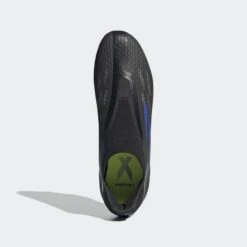 ADIDAS Unisex X Speedflow .3 Laceless FG Soccer Shoe - Black/Sonic Ink/Solar Yellow -Gazelle Sports Shop X Speedflow.3 Laceless Firm Ground Cleats Black FY3273 02 standard hover