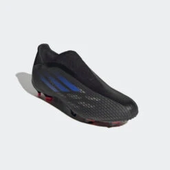 ADIDAS Unisex X Speedflow .3 Laceless FG Soccer Shoe - Black/Sonic Ink/Solar Yellow -Gazelle Sports Shop X Speedflow.3 Laceless Firm Ground Cleats Black FY3273 04 standard